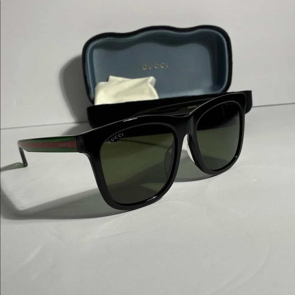 New Authentic GG0057SKN 002 Gucci Black Sunglasses with Green Lenses